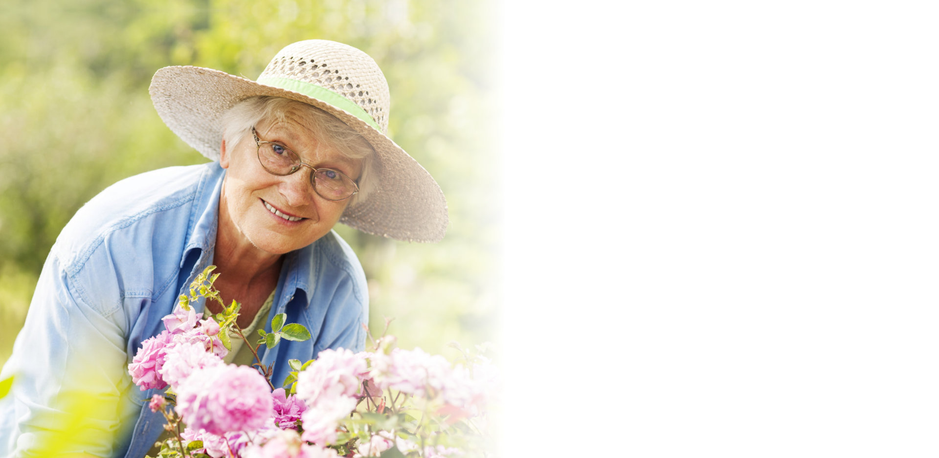 Senior woman with flowers in garden