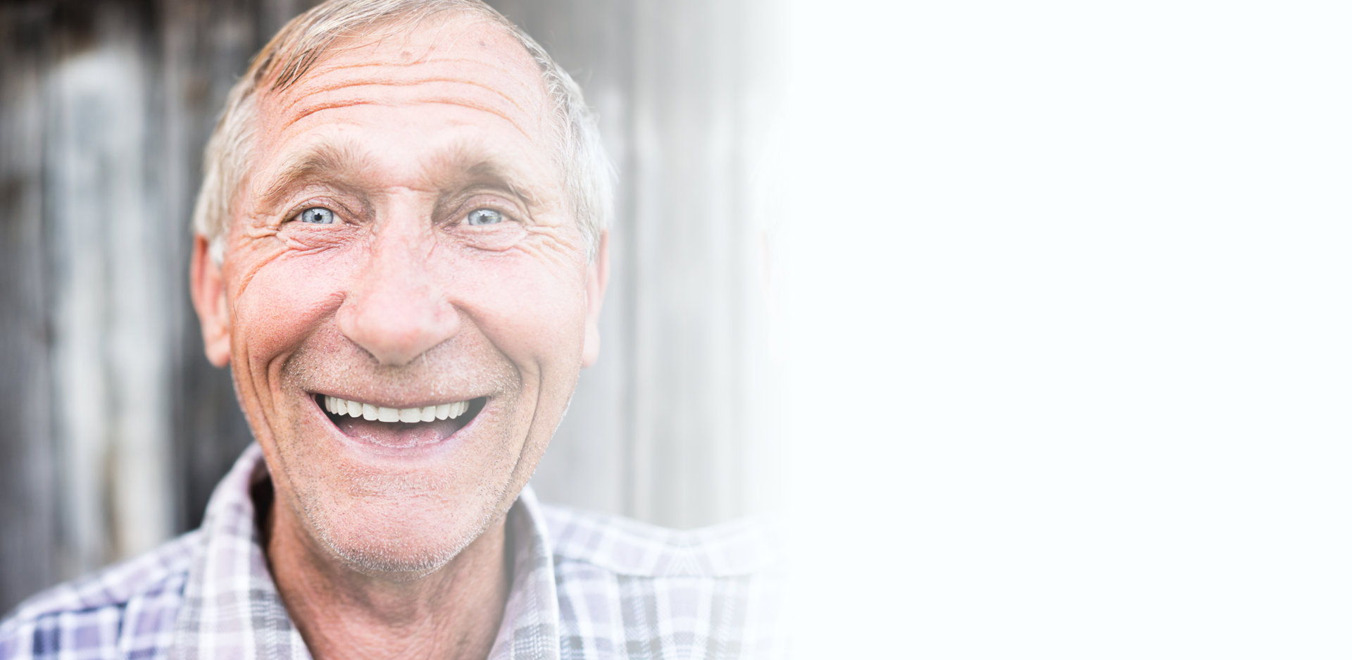 senior man smiling at camera